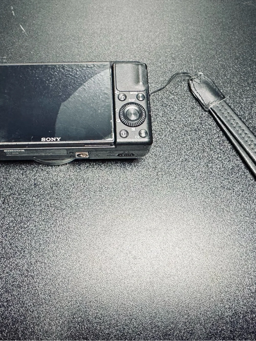 Sony Black Compact Digital Camera with Zeiss Lens and Wind Muff